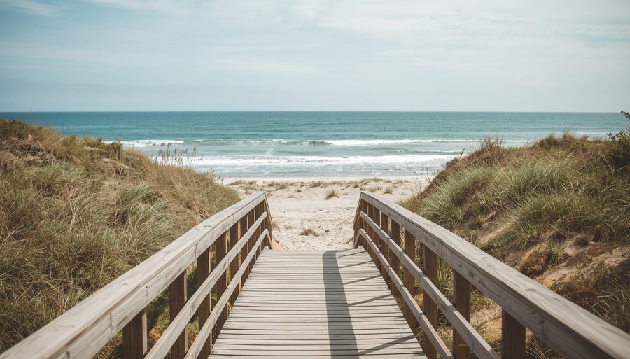 Gentle ocean waves flowing over smooth stones — therapy moving at the pace of the person